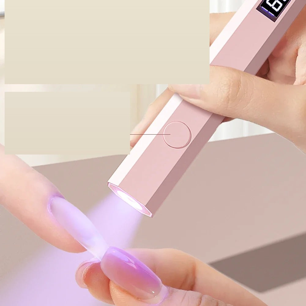 Flexible handheld UV nail lamp in use